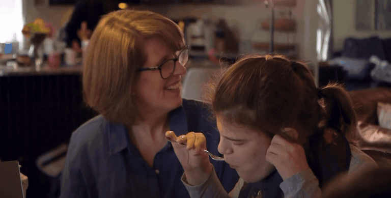 Parent and child sharing a meal