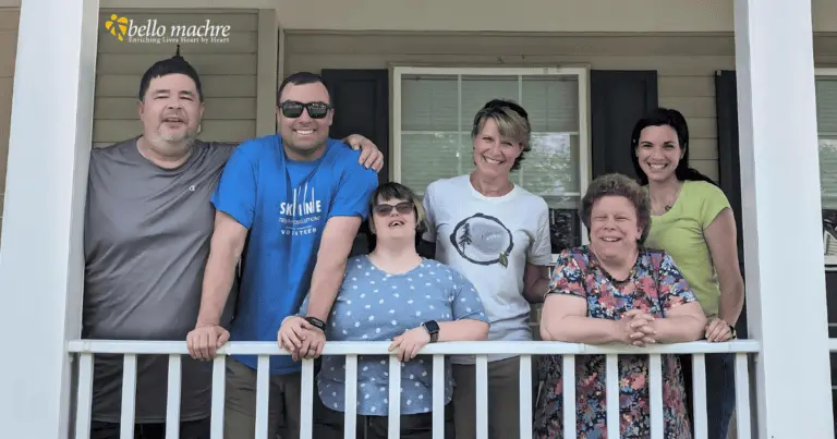 Group home residents standing on front porch