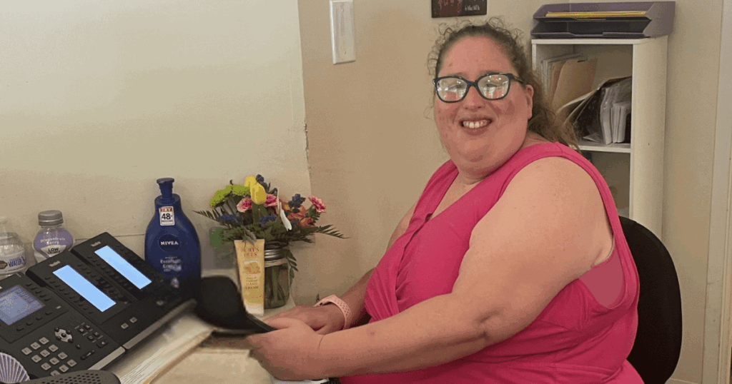 Clerical worker sitting at desk