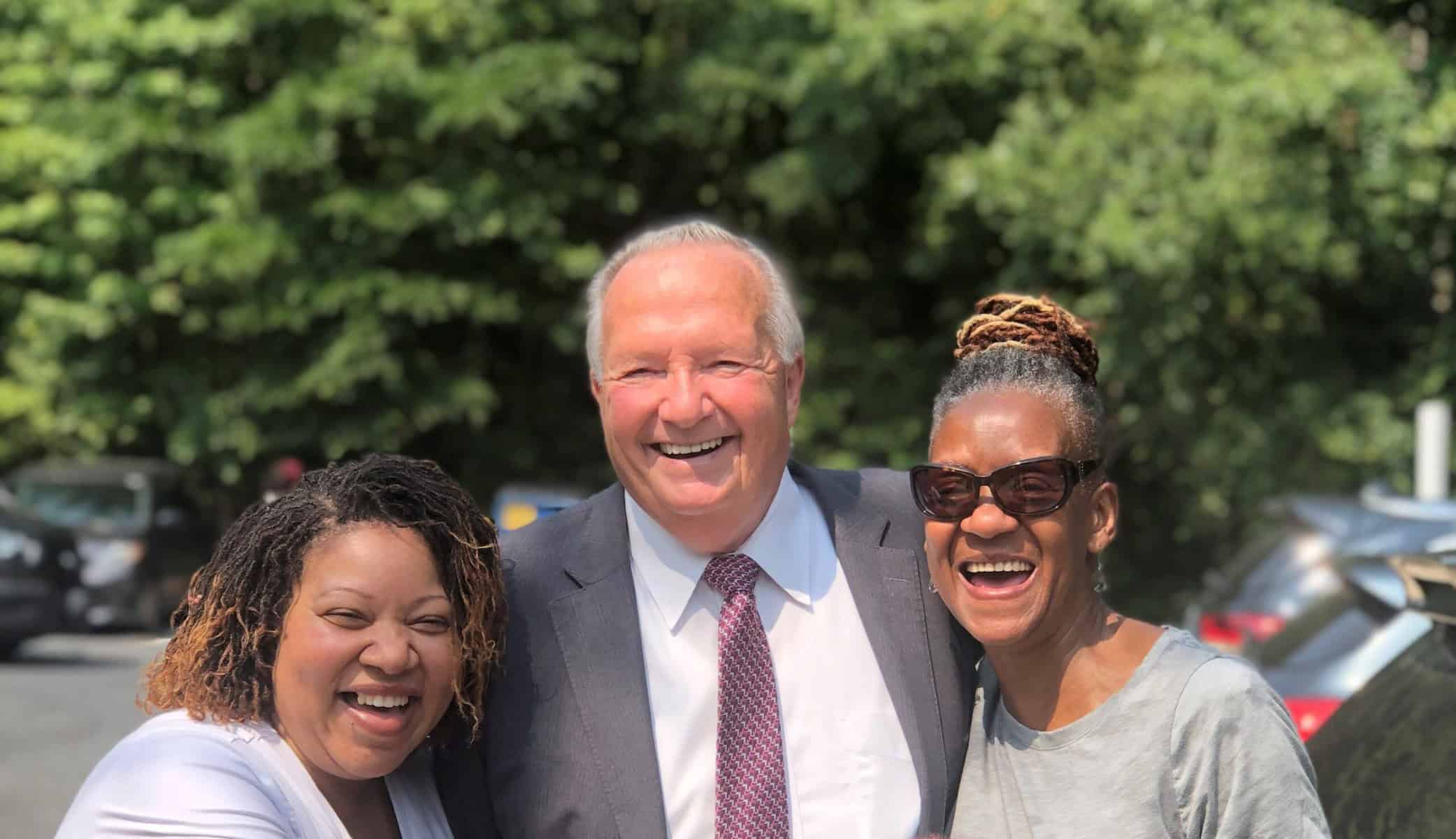 Dr. Ireland and two Bello Machre DSPs smiling