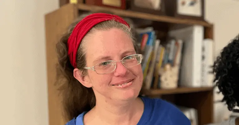 Rebecca smiling at the camera