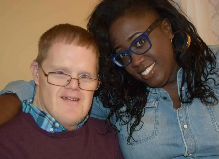 DSP and resident smiling at camera